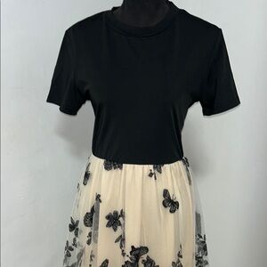 Chic Black Top with Cream Floral Skirt